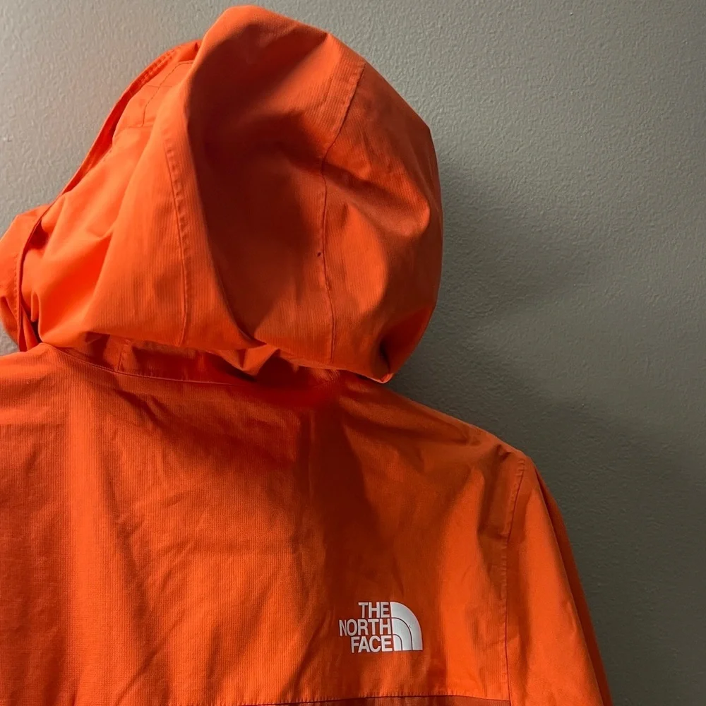 The North Face Vibrant Orange and Black Jacket